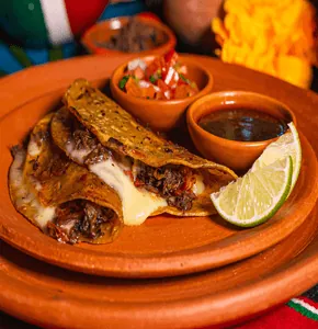 Quesabirria — slow-cooked lamb quesadillas
